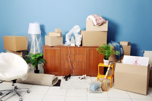 Packed boxes and furniture ready for house removals in Maida Vale
