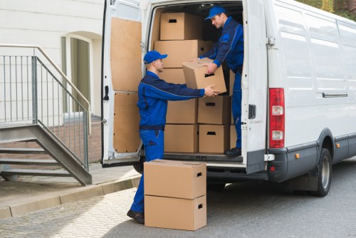 Removal team planning a move in Maida Vale residential street