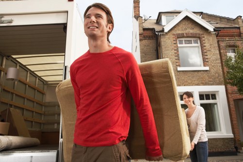 Careful removal of a sofa and other furniture from a Maida Vale flat