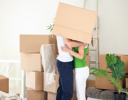Boxes and wrapped furniture ready for a flat removal service in Maida Vale