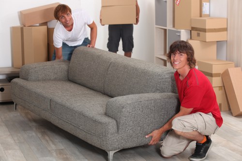 Furniture and boxes loaded into a moving truck in West London