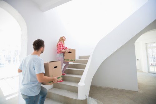 Packed boxes ready for urgent removals in a Maida Vale flat