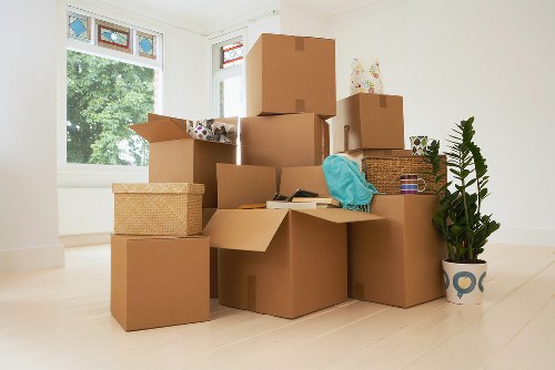 Office items being loaded carefully for a business move near Warwick Avenue