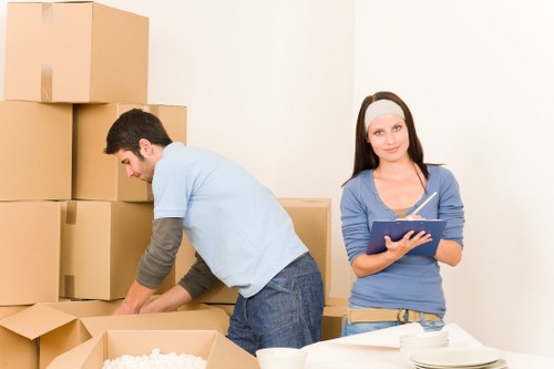 Preparing household items for transport by van in Maida Vale